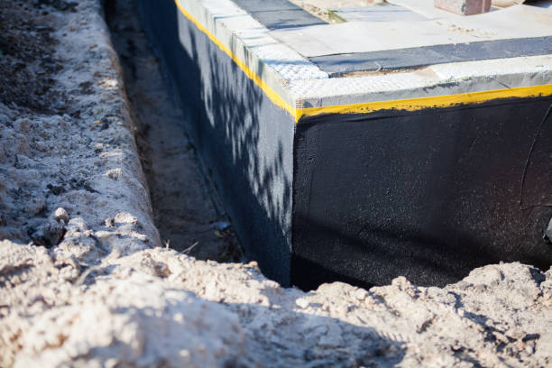 Professional Waterproofing technician working in Florence, SC